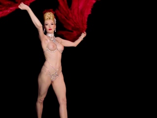 Latina Calypso Muse posing in lingerie